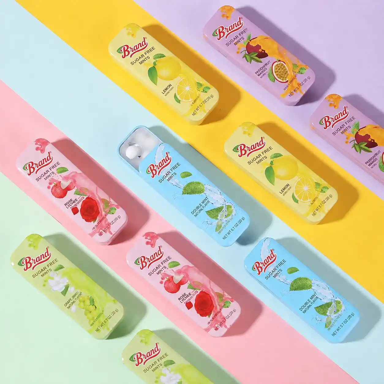 Sugar free mint balls five color tins flat lay