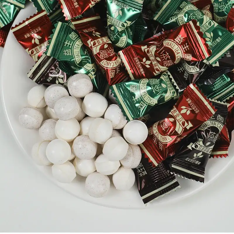 Tea candy white pieces and wrappers